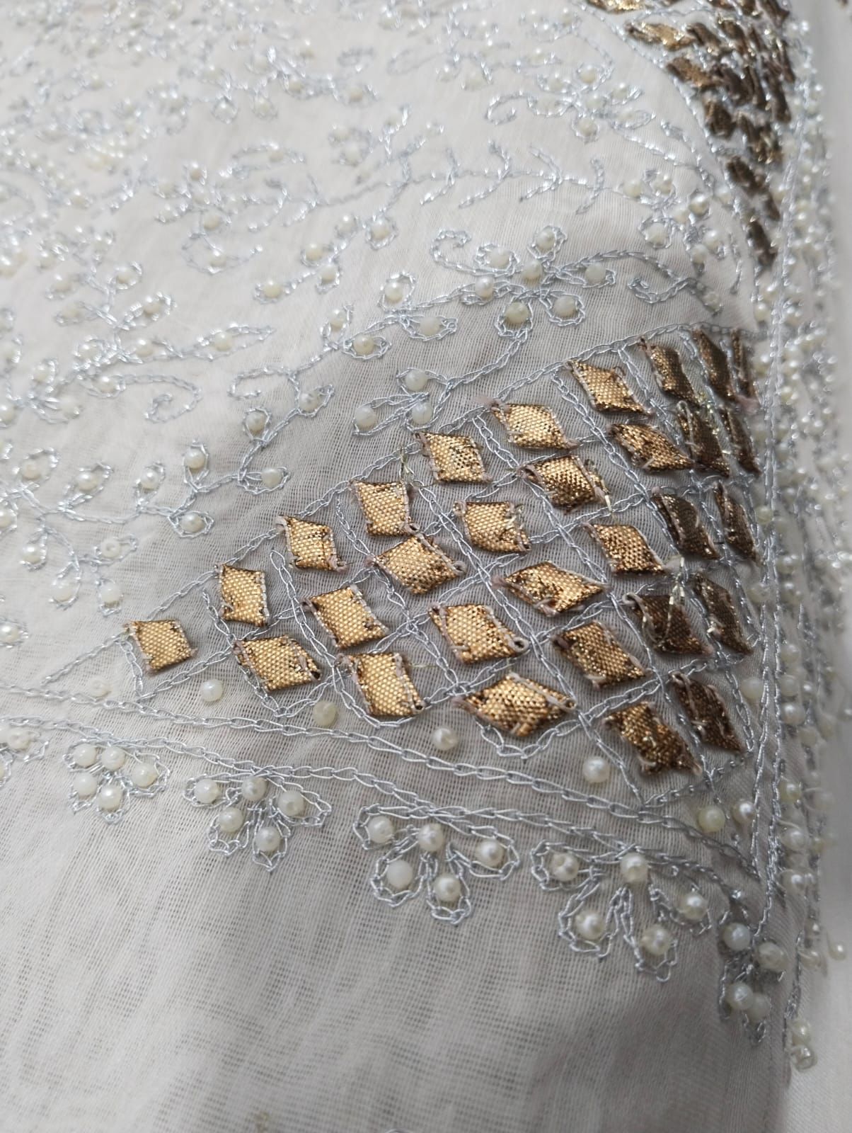 Signature Article: hand embroidered Aar , Pearl and gotta work Signature Article: hand embroidered Aar , Pearl and gotta work